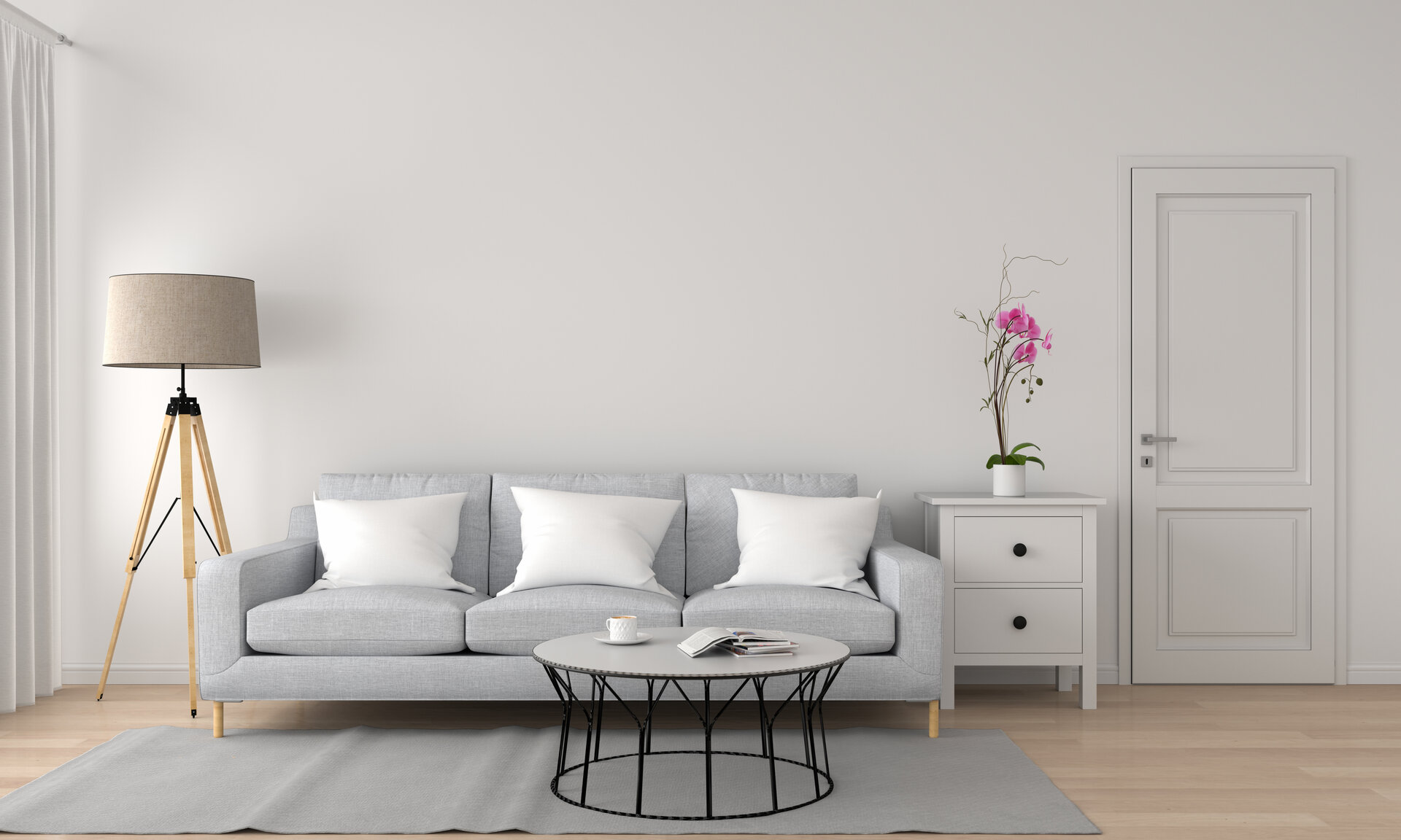Graues Sofa und Lampe im weißen Wohnzimmer, designvoller, skandinavischer Stil